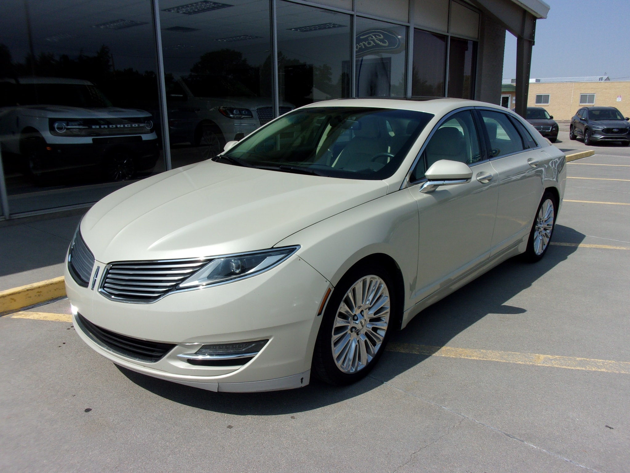 Used 2014 Lincoln MKZ Base with VIN 3LN6L2J97ER811114 for sale in Colby, KS