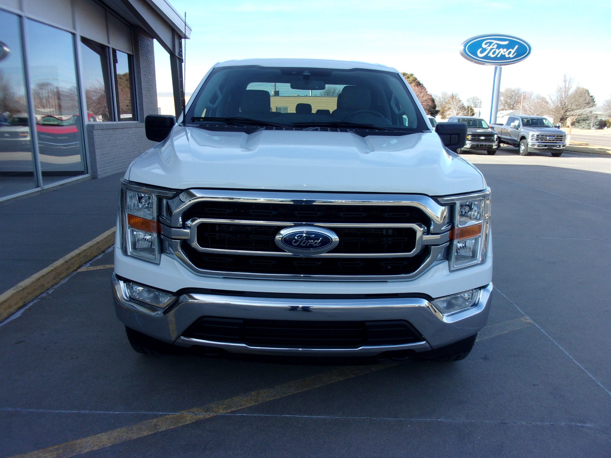 Used 2023 Ford F-150 XLT with VIN 1FTFW1E53PFB72033 for sale in Colby, KS