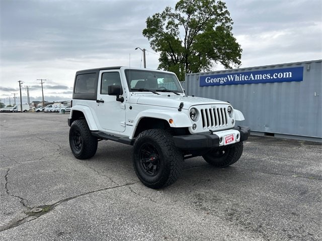 Used 2016 Jeep Wrangler Sahara with VIN 1C4AJWBG0GL124227 for sale in Ames, IA