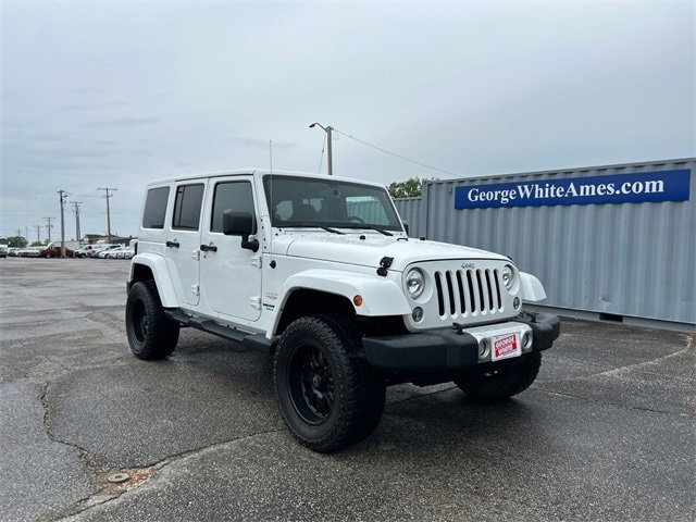 Used 2014 Jeep Wrangler Unlimited Sahara with VIN 1C4BJWEG5EL136628 for sale in Ames, IA