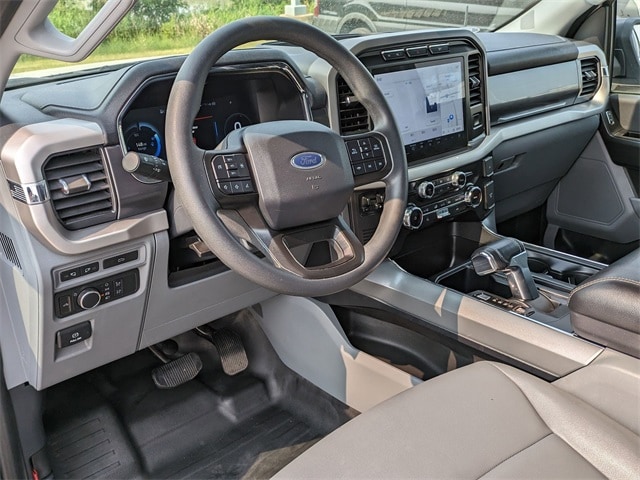 Used 2022 Ford F-150 Lightning Pro with VIN 1FTVW1EL9NWG02462 for sale in North Aurora, IL