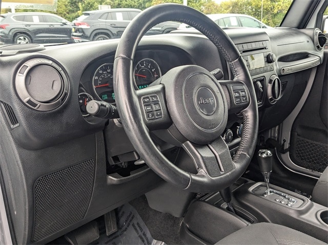 Used 2015 Jeep Wrangler Unlimited Sport with VIN 1C4BJWDG2FL770823 for sale in North Aurora, IL