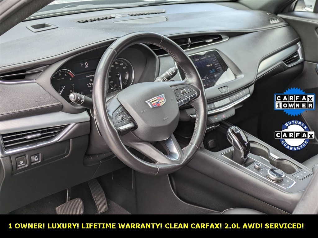 Certified 2022 Cadillac XT4 Premium Luxury with VIN 1GYFZDR42NF136142 for sale in North Aurora, IL