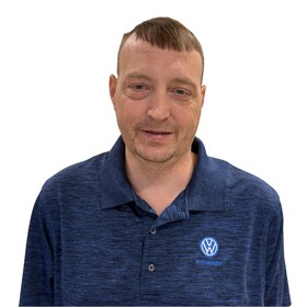 Staff member Hugh Wilson  from ID_2a4f2e64640e