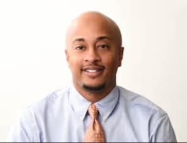 Staff member JOHNATHAN MOORE from ID_3eaa54