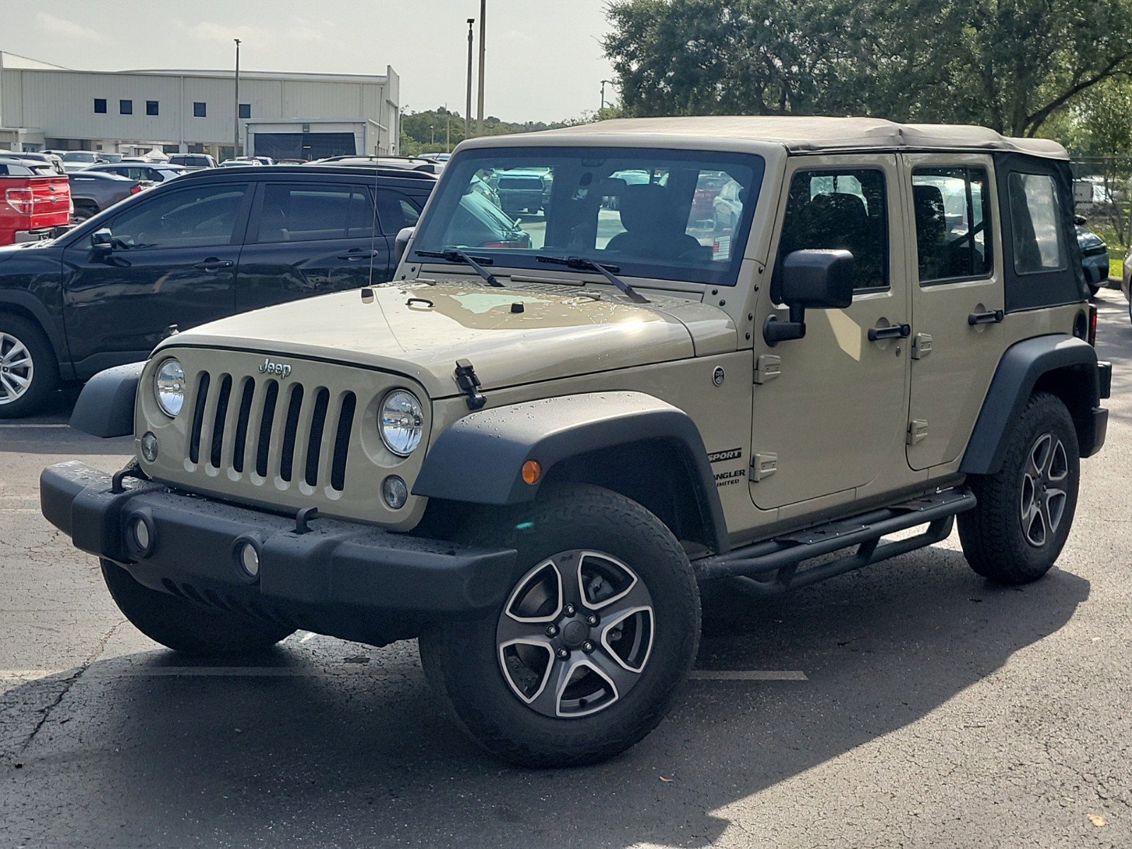 Used 2017 Jeep Wrangler Unlimited Sport with VIN 1C4BJWDG4HL623261 for sale in Tampa, FL