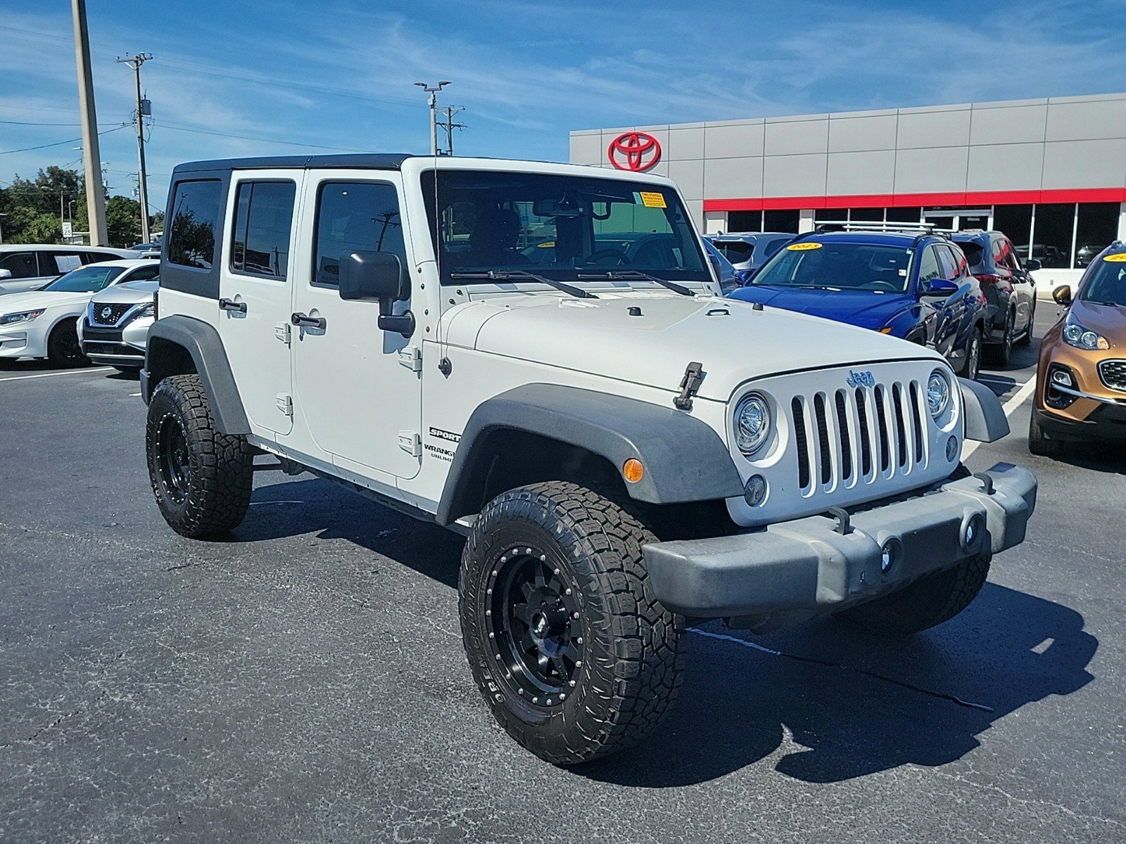 Used 2017 Jeep Wrangler Unlimited Sport S with VIN 1C4BJWDG2HL521263 for sale in Tampa, FL