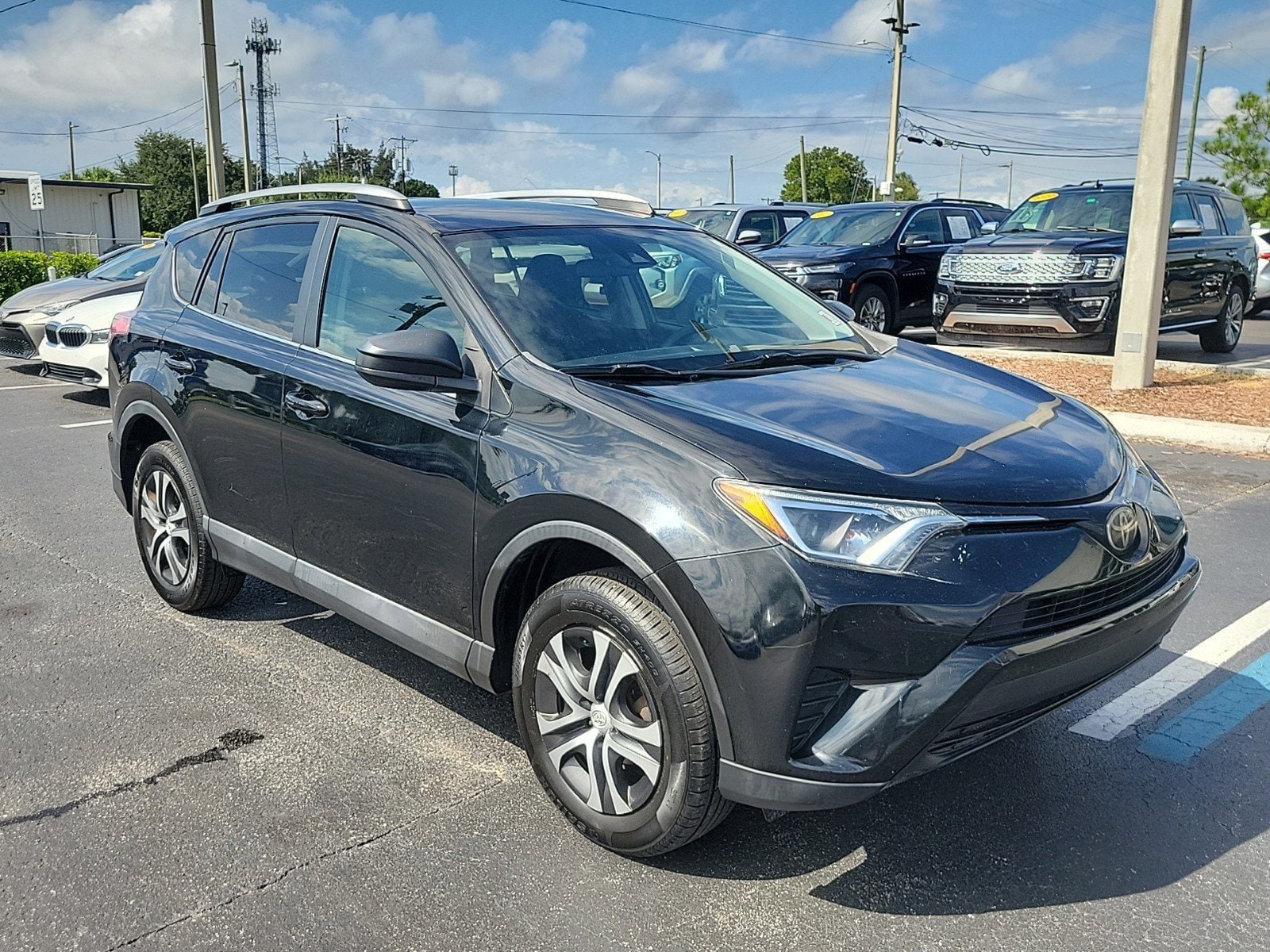 Used 2018 Toyota RAV4 LE with VIN 2T3ZFREVXJW485405 for sale in Tampa, FL