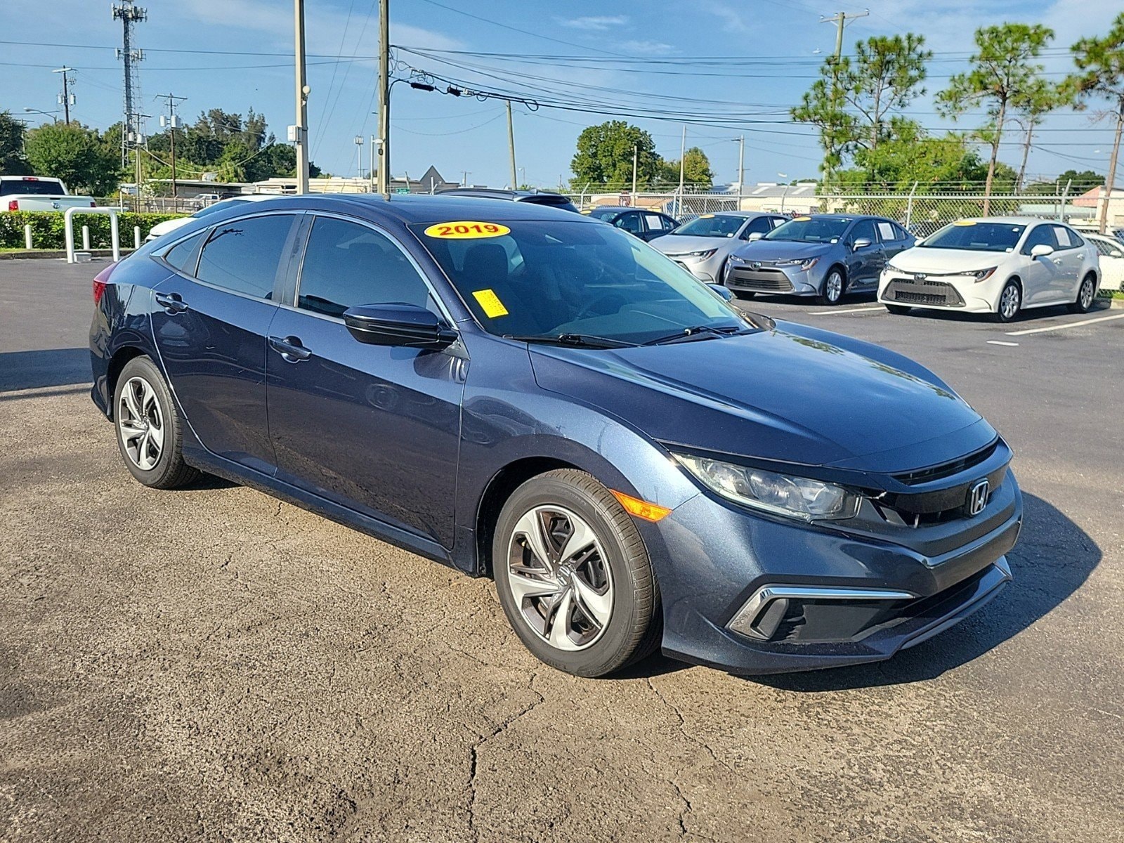 Used 2019 Honda Civic LX with VIN 19XFC2F66KE033863 for sale in Tampa, FL