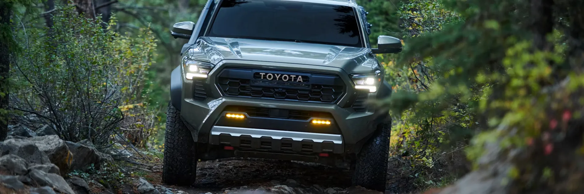Toyota Tacoma Trailhunter Driving Through Forest