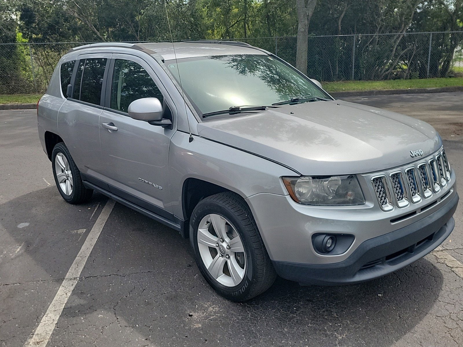 Used 2016 Jeep Compass Latitude with VIN 1C4NJDEB1GD594217 for sale in Tampa, FL