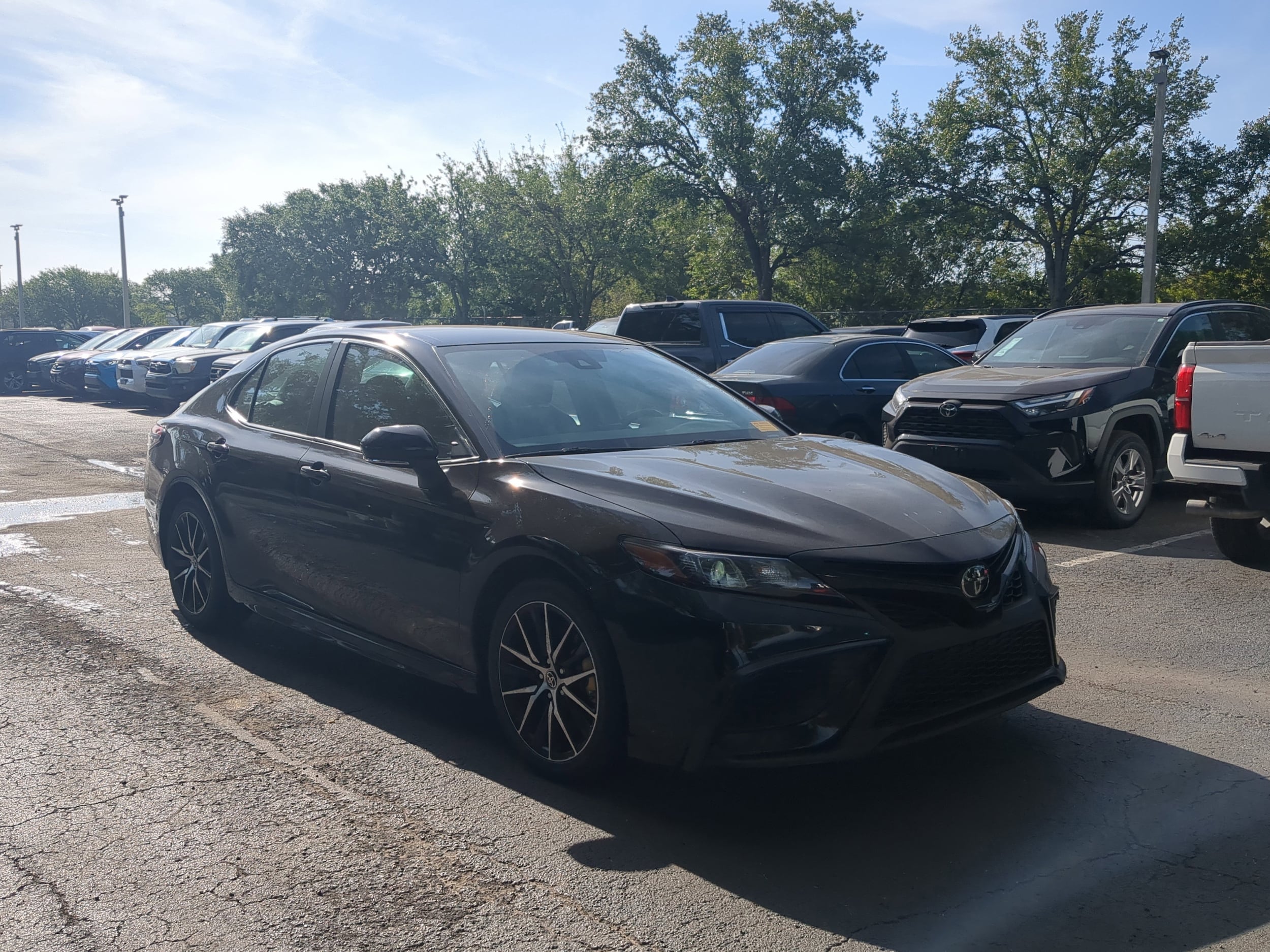 Used 2024 Toyota Camry SE with VIN 4T1G11AK9RU212088 for sale in Tampa, FL