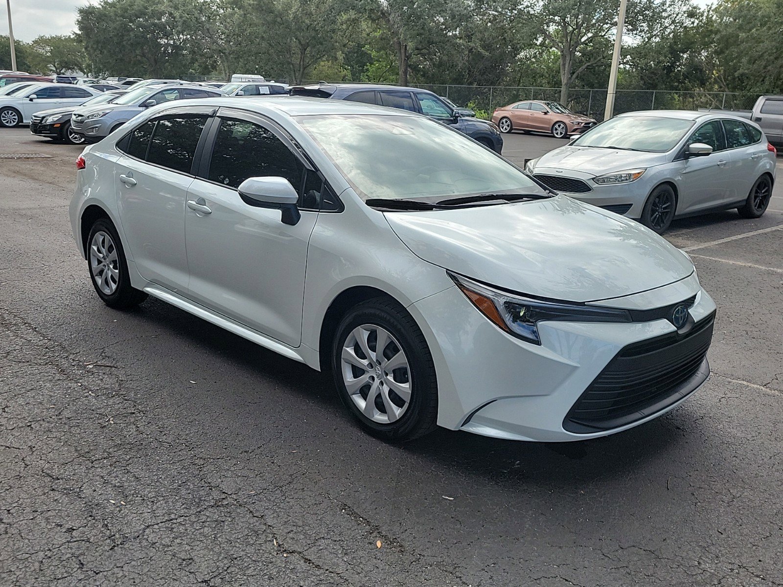 Used 2024 Toyota Corolla LE with VIN JTDBCMFE1R3032140 for sale in Tampa, FL