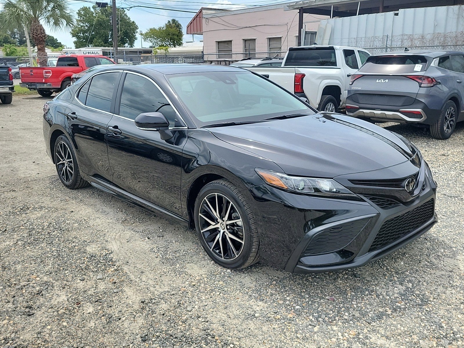 Used 2024 Toyota Camry SE with VIN 4T1G11AK0RU870575 for sale in Tampa, FL