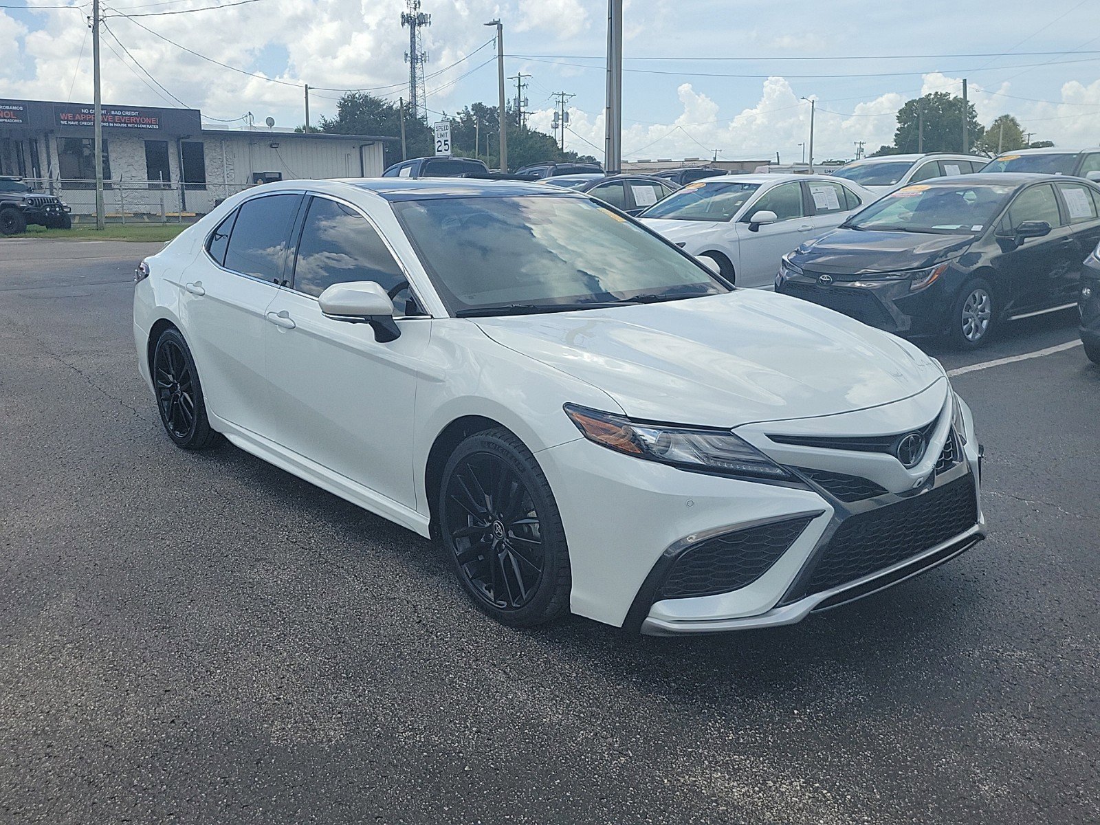 Used 2021 Toyota Camry XSE with VIN 4T1K61AK0MU468110 for sale in Tampa, FL