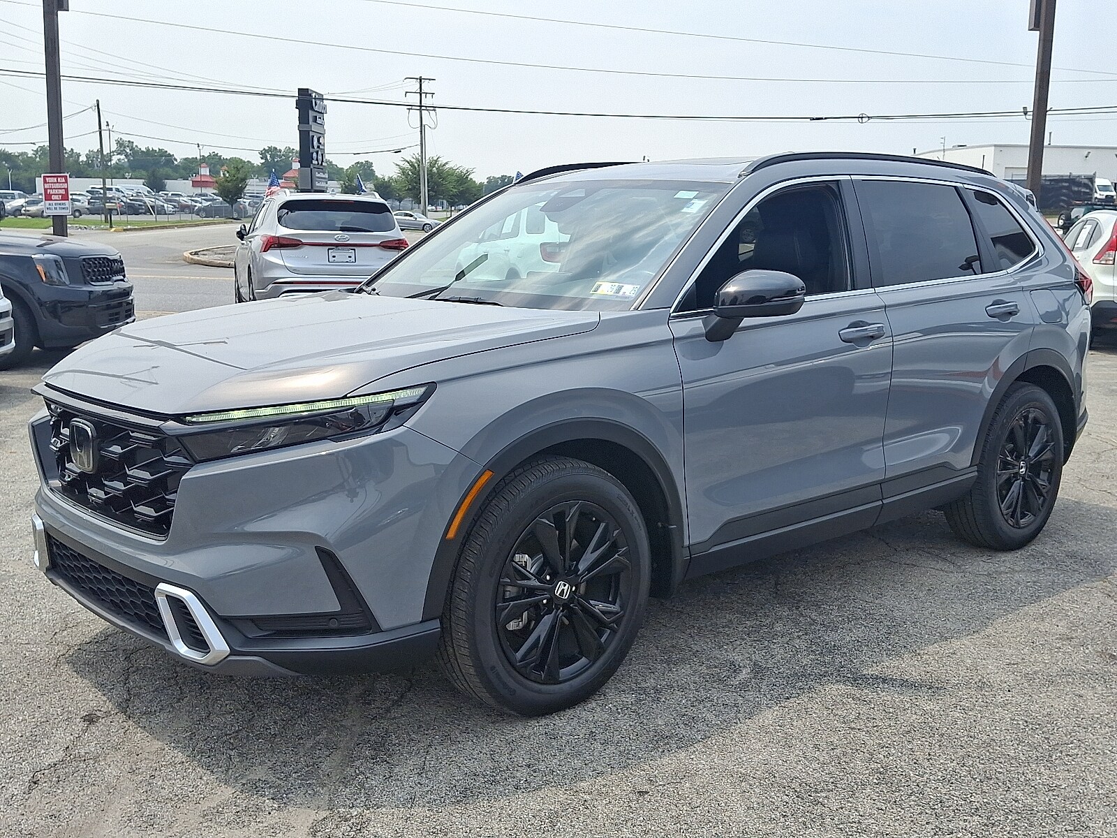 2023 Honda CR-V Hybrid Sport Touring photo 3
