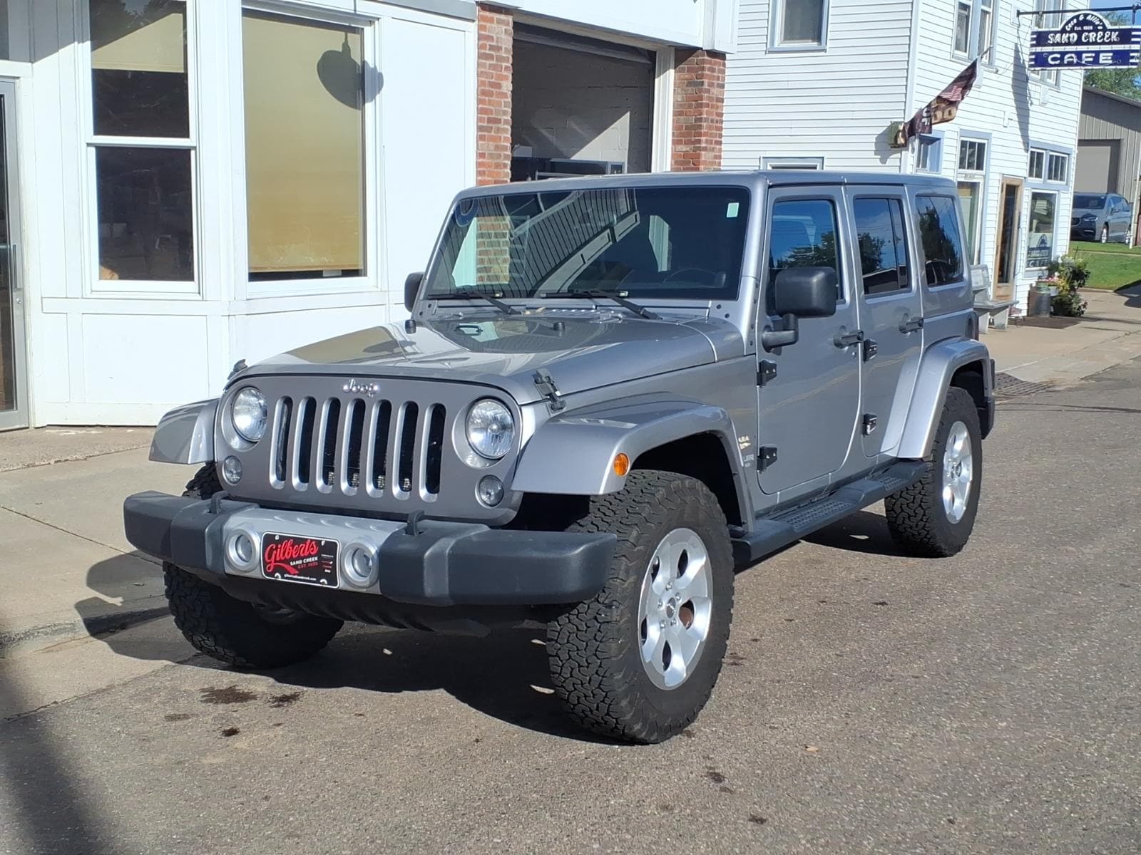 Used 2014 Jeep Wrangler Unlimited Sahara with VIN 1C4HJWEG2EL241234 for sale in Sand Creek, WI