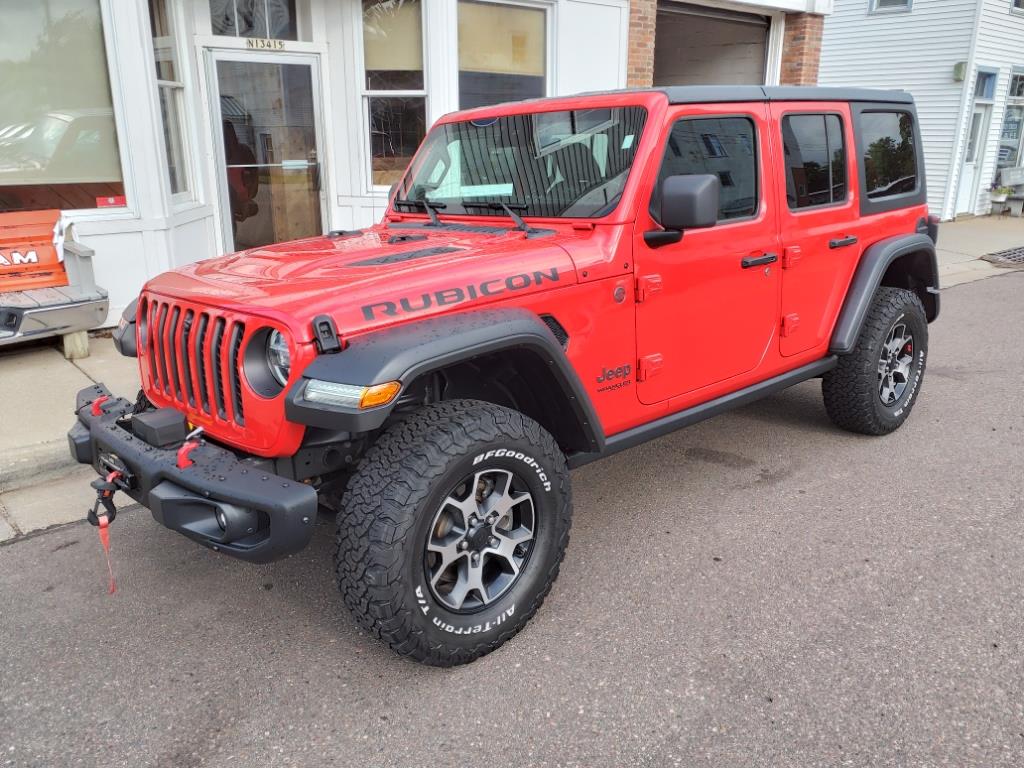 Used 2021 Jeep Wrangler Unlimited Rubicon with VIN 1C4JJXFM7MW561707 for sale in Sand Creek, WI