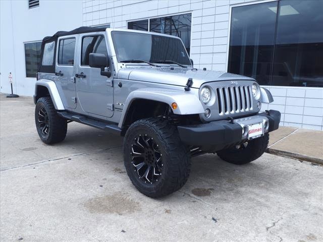 Used 2018 Jeep Wrangler JK Unlimited Sahara with VIN 1C4HJWEG7JL919017 for sale in Houston, TX