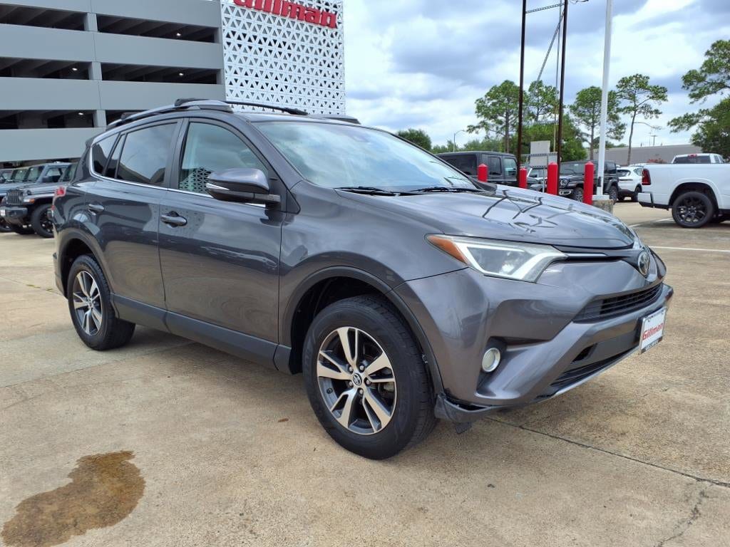 Used 2017 Toyota RAV4 XLE with VIN 2T3RFREV0HW647374 for sale in Houston, TX