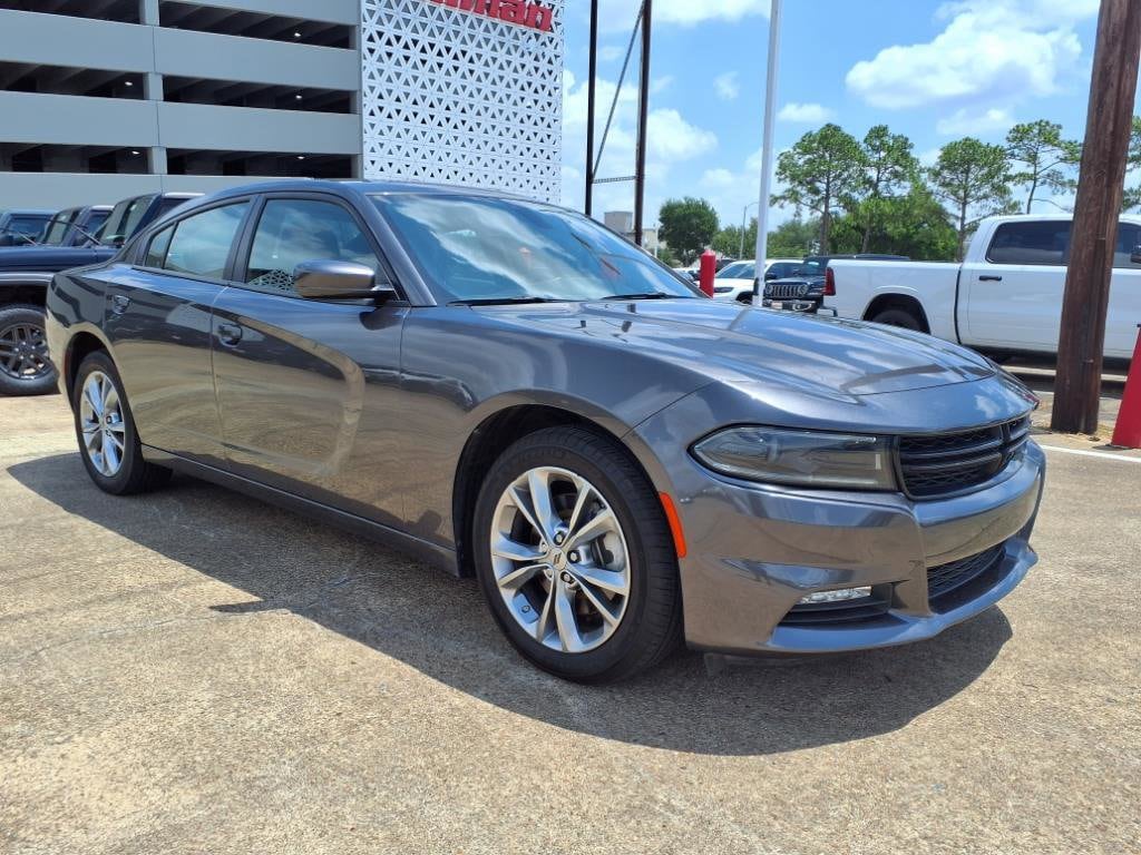 Used 2022 Dodge Charger SXT with VIN 2C3CDXJG7NH214190 for sale in Houston, TX