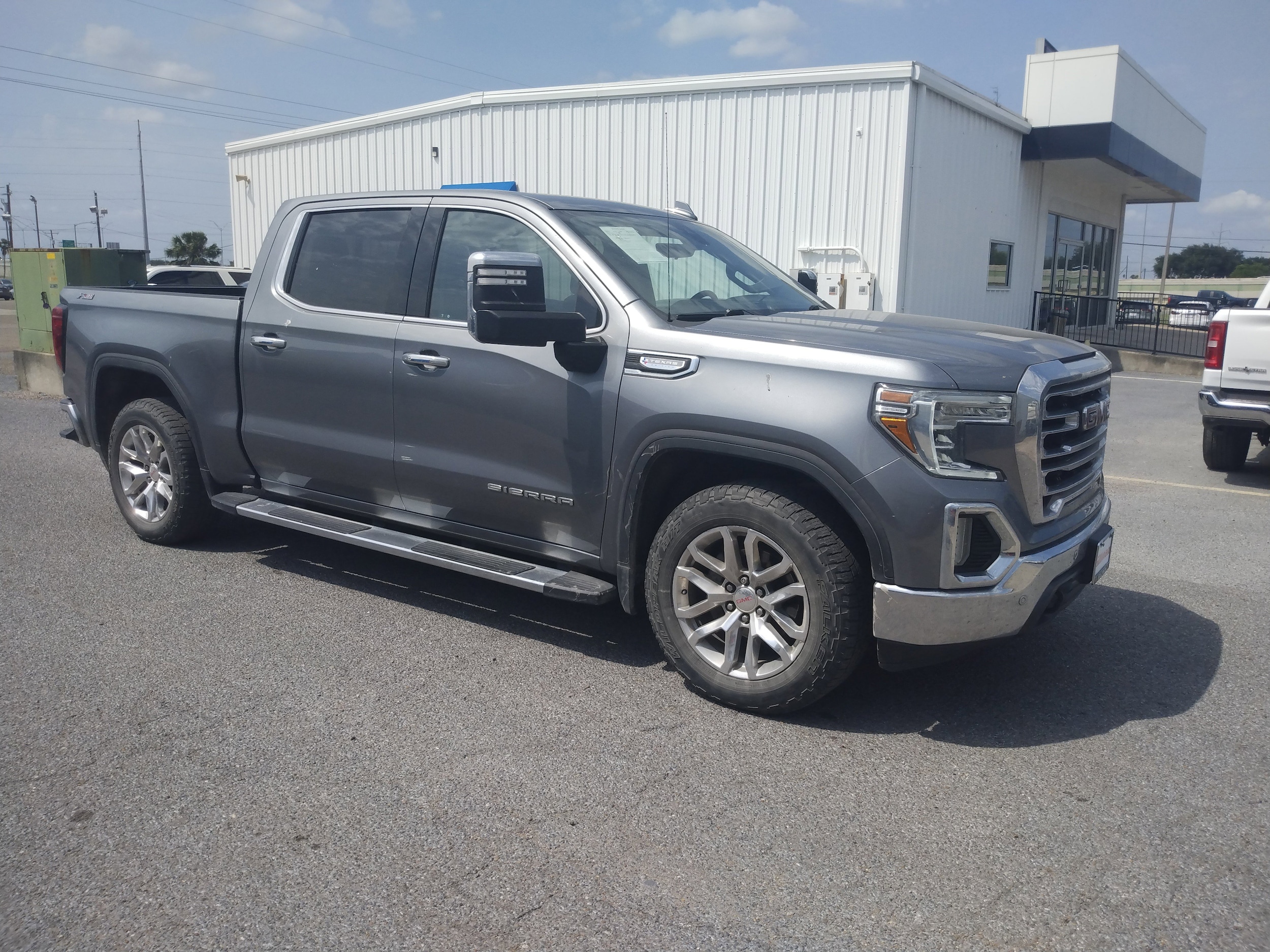 Used 2021 GMC Sierra 1500 SLT with VIN 3GTU9DED1MG245532 for sale in San Benito, TX