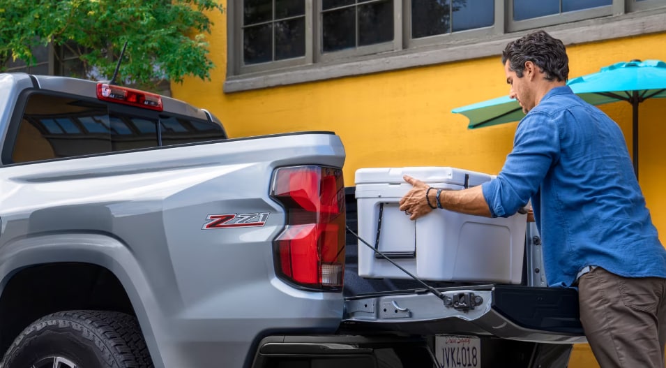 2026 Chevrolet Colorado Z71 - Man Loading Truckbed