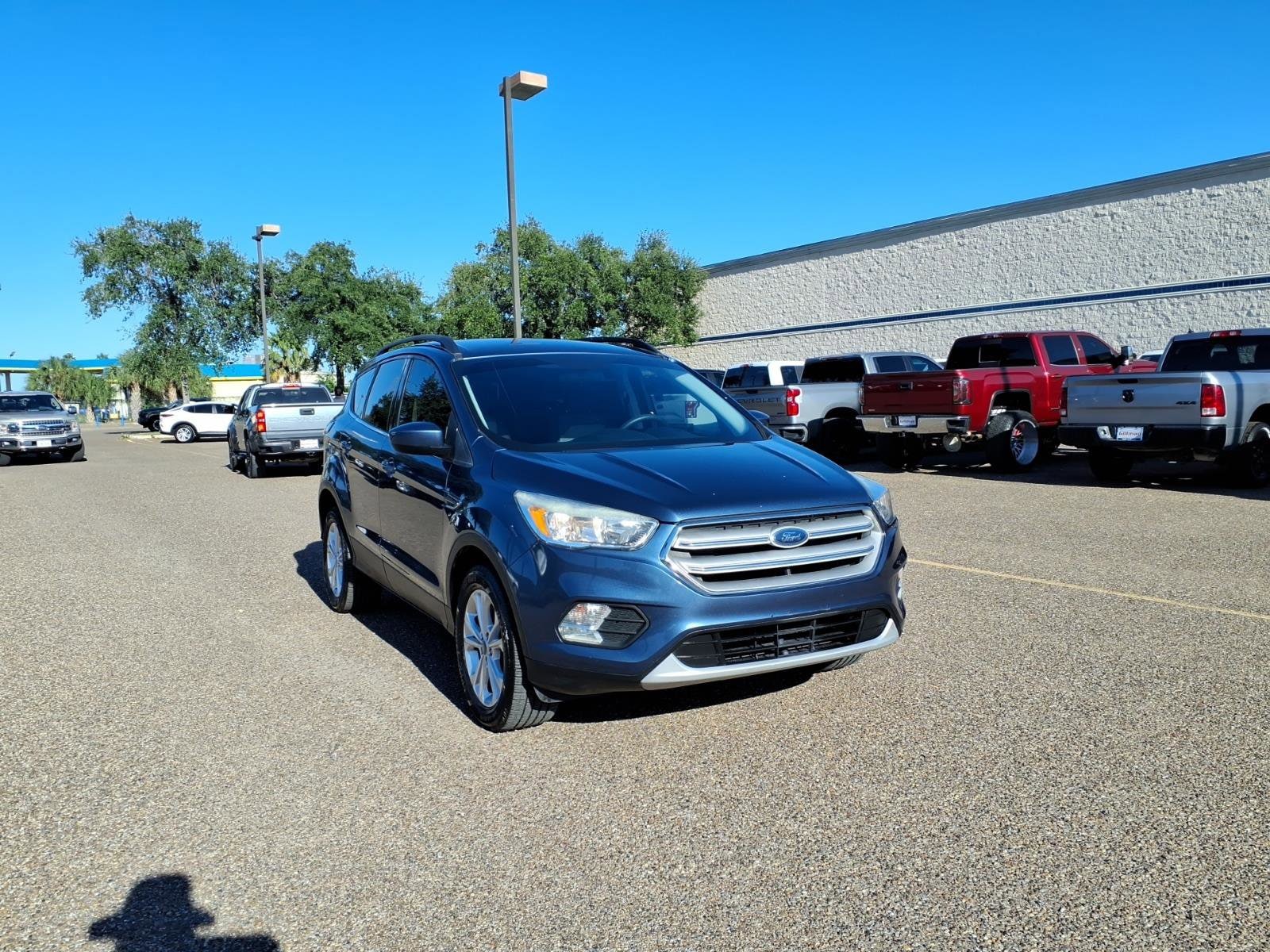 Used 2018 Ford Escape SE with VIN 1FMCU9GD6JUA76133 for sale in Harlingen, TX