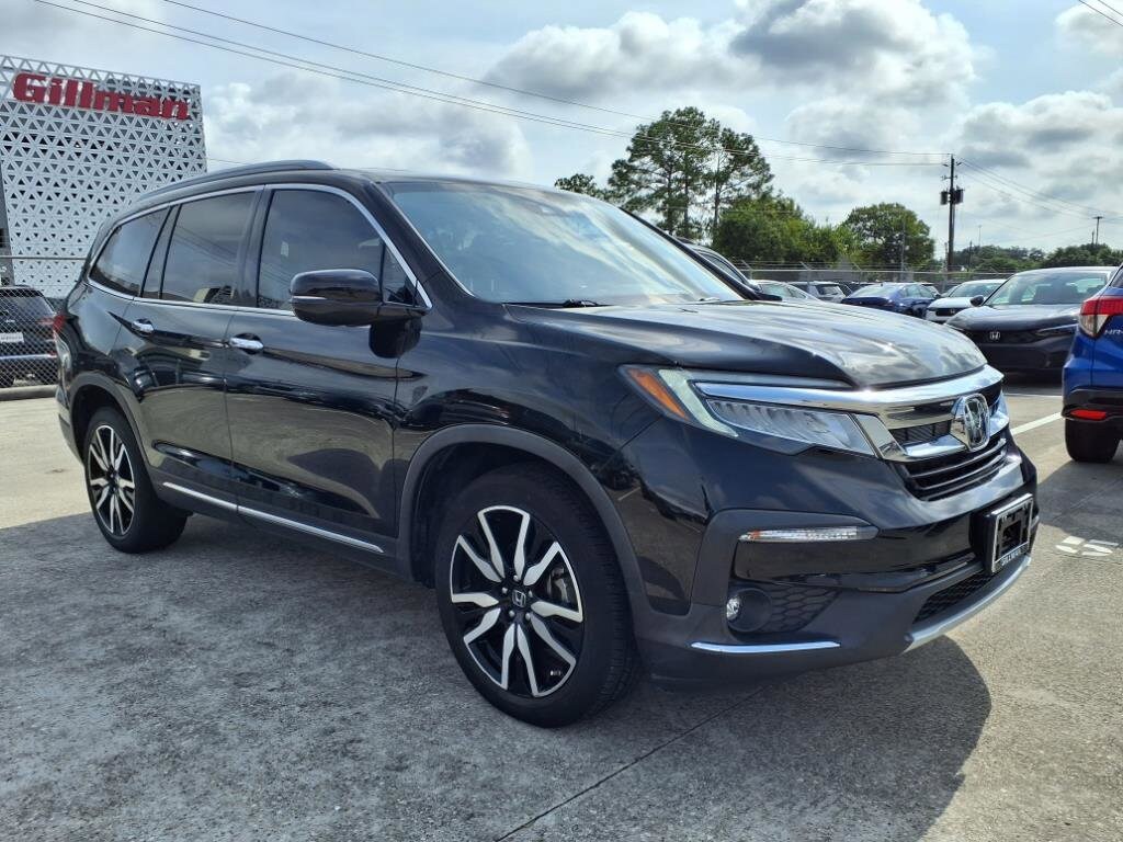 Certified 2022 Honda Pilot Touring with VIN 5FNYF5H61NB022847 for sale in Houston, TX