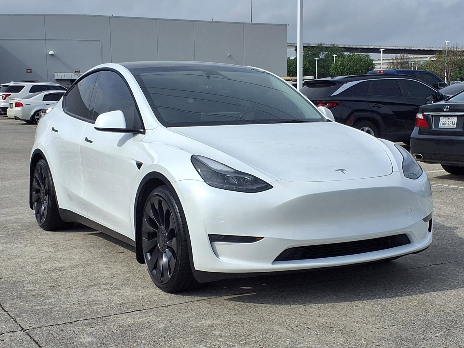 Used 2024 Tesla Model Y Performance with VIN 7SAYGDEF0RA325099 for sale in Houston, TX