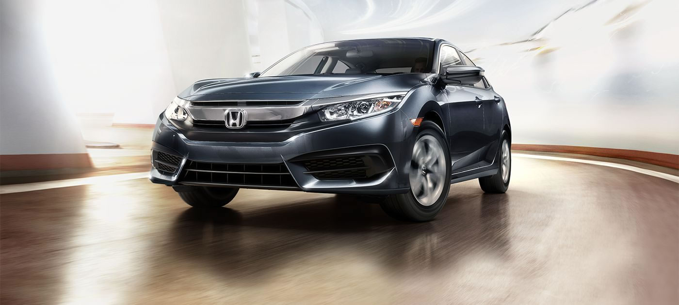 2018-civic-sedan-touring-ext-b-593m-78-front-driver-static-1400-1x.jpg