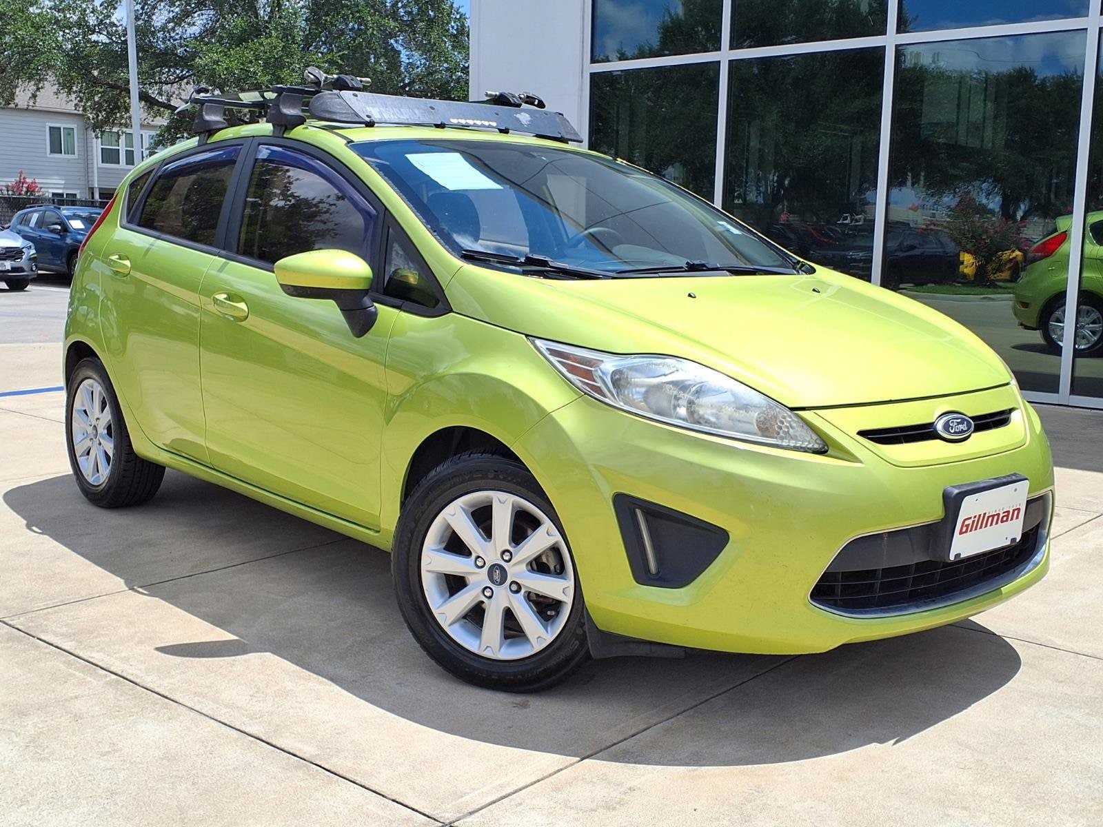 Used 2012 Ford Fiesta SE with VIN 3FADP4EJ4CM221047 for sale in Houston, TX