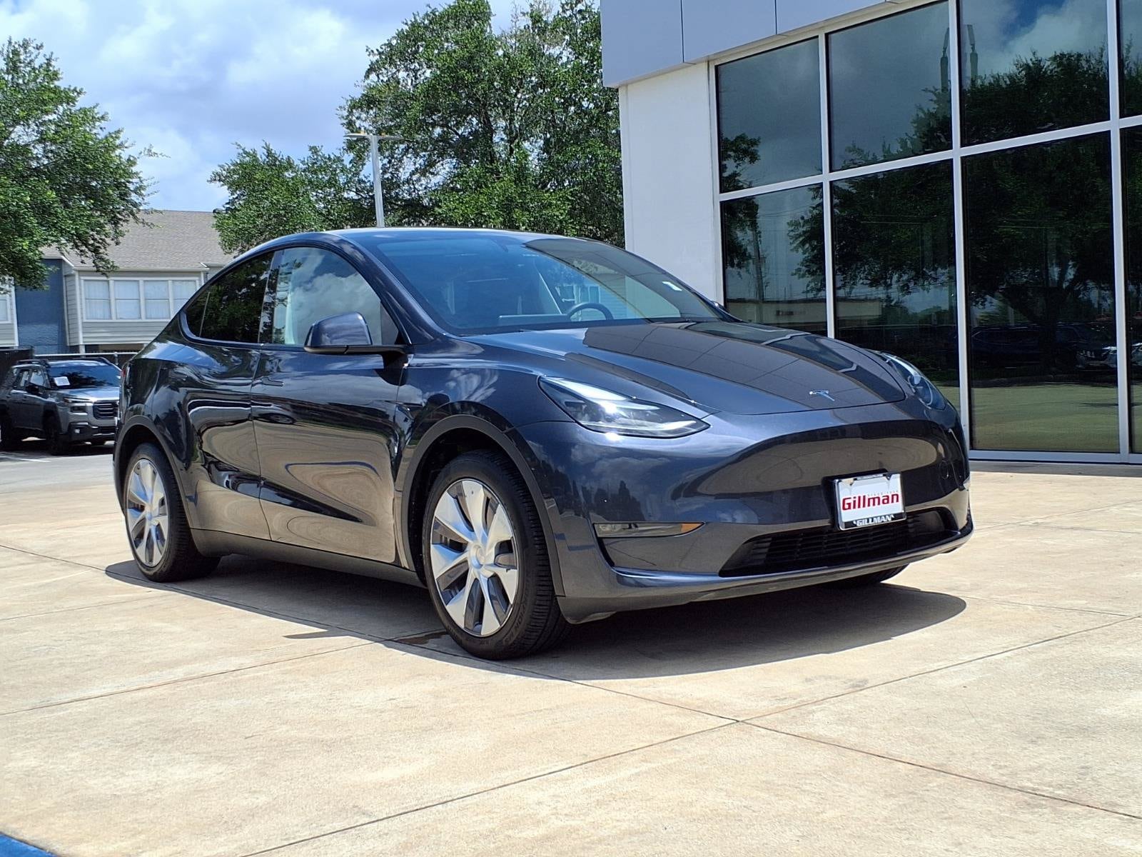 Used 2024 Tesla Model Y Long Range with VIN 7SAYGDEE5RA225300 for sale in Houston, TX