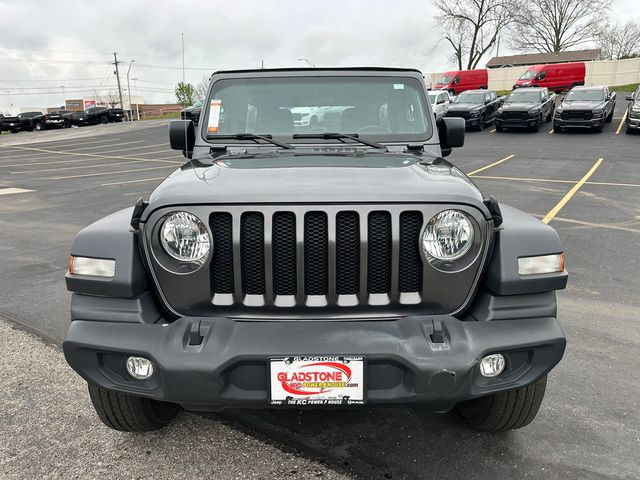 Used 2023 Jeep Wrangler 4-Door Sport with VIN 1C4HJXDN3PW598462 for sale in Kansas City
