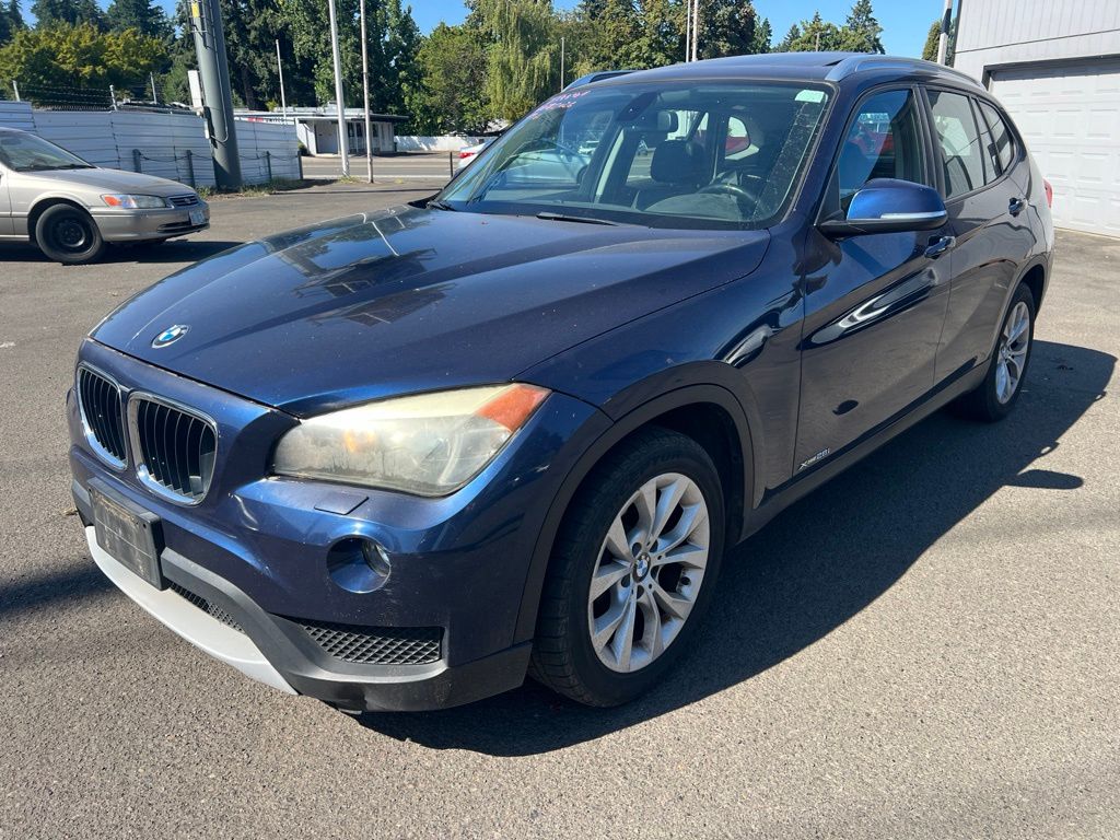 Used 2013 BMW X1 28i with VIN WBAVL1C58DVR88404 for sale in Milwaukie, OR