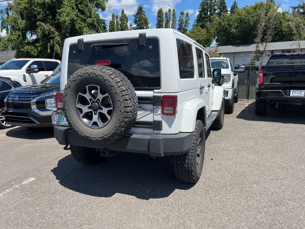 Used 2015 Jeep Wrangler Unlimited Sahara with VIN 1C4BJWEG1FL590828 for sale in Milwaukie, OR