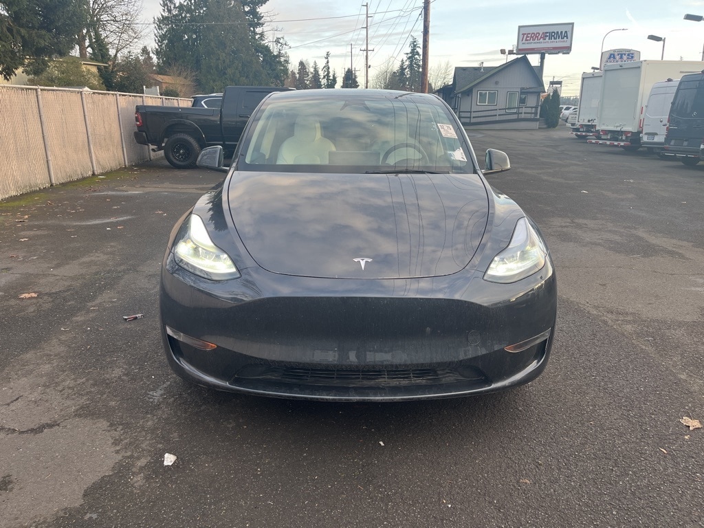 Used 2025 Tesla Model Y Long Range with VIN 7SAYGDEDXSF230671 for sale in Milwaukie, OR