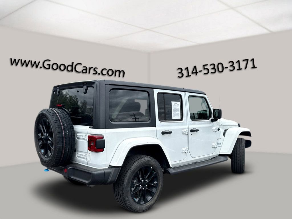 Used 2023 Jeep Wrangler 4xe Sahara 4XE with VIN 1C4JJXP61PW555695 for sale in St. Louis, MO