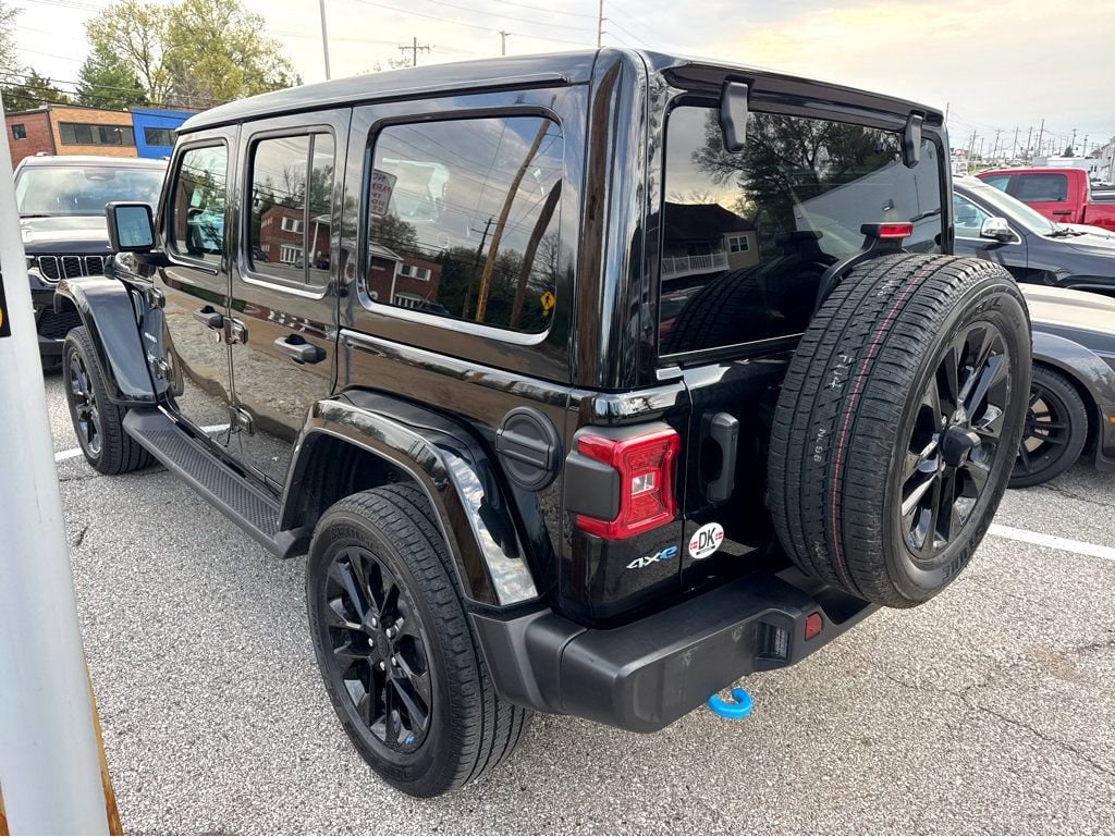 Used 2023 Jeep Wrangler 4xe Sahara 4XE with VIN 1C4JJXP63PW524433 for sale in St. Louis, MO