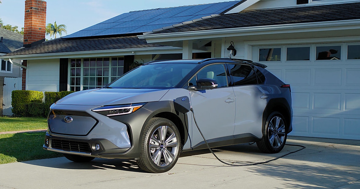 Subaru Solterra charging at home in the driveway