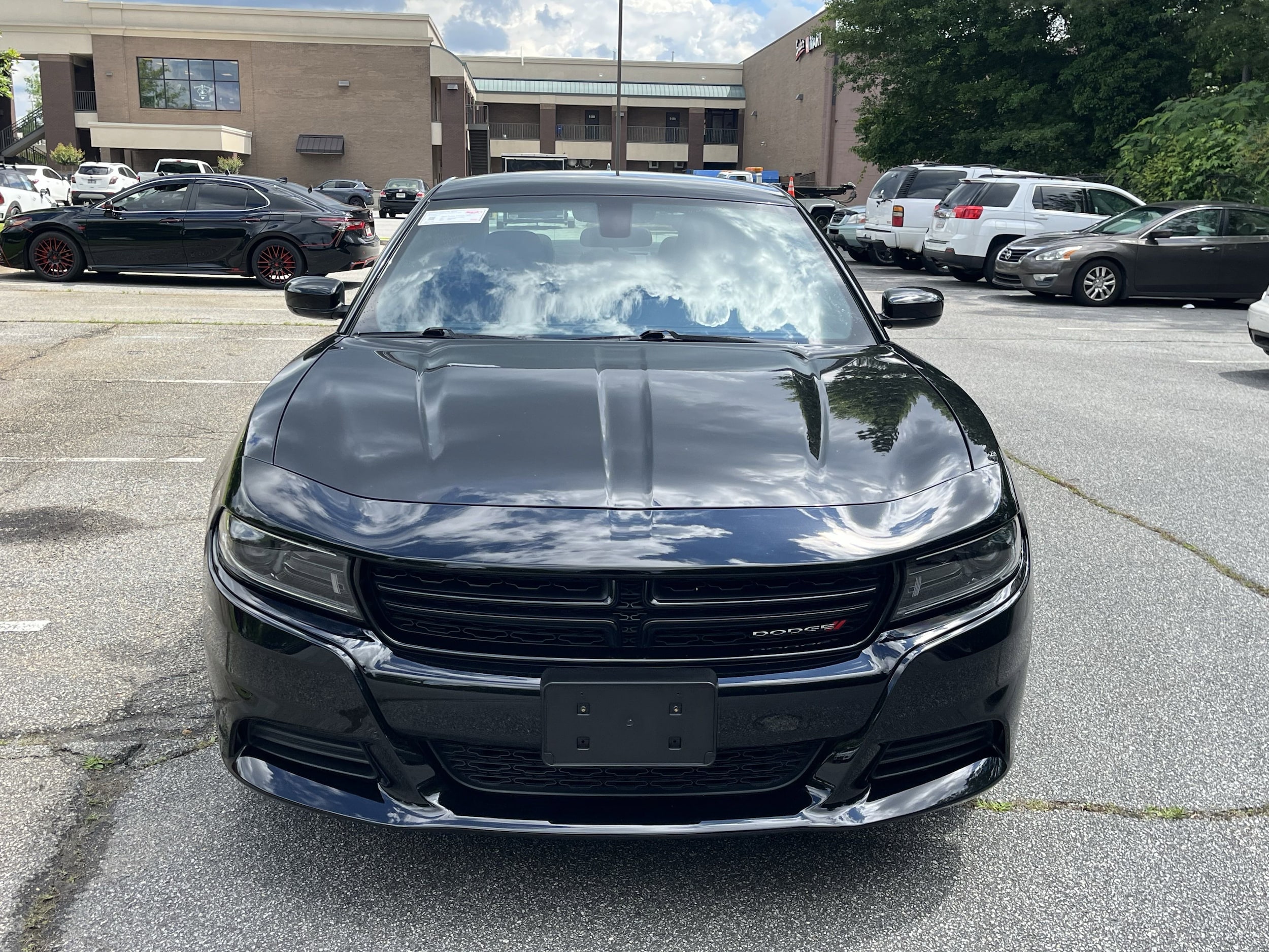 Used 2023 Dodge Charger SXT with VIN 2C3CDXBG4PH555385 for sale in Chamblee, GA