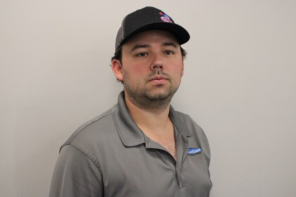Staff member Adam Hampton from ID_a9797a
