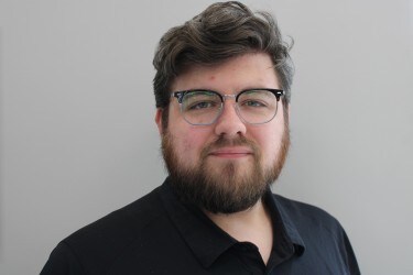 Staff member Eric Carter from ID_07bd9e3e7fc5