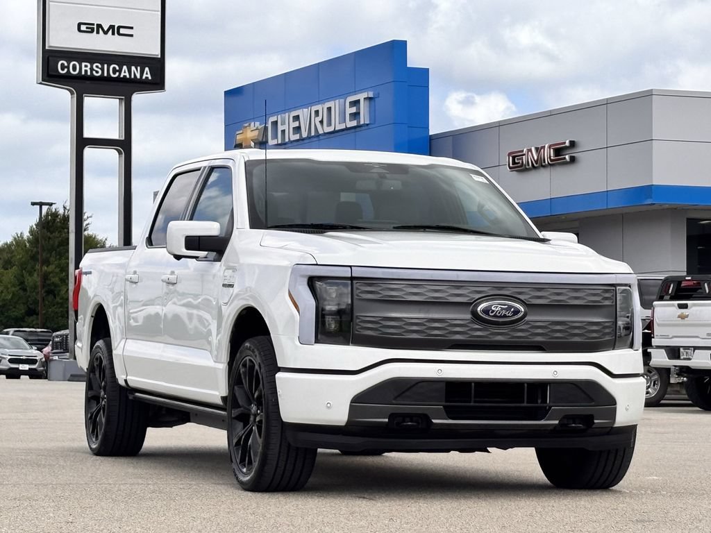 Used 2023 Ford F-150 Lightning Lariat with VIN 1FTVW1EV5PWG56796 for sale in Corsicana, TX