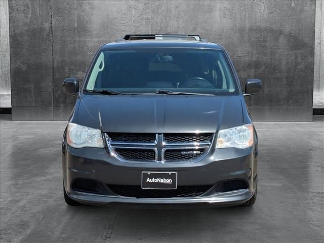 Used 2012 Dodge Grand Caravan SXT with VIN 2C4RDGCG1CR149704 for sale in Littleton, CO