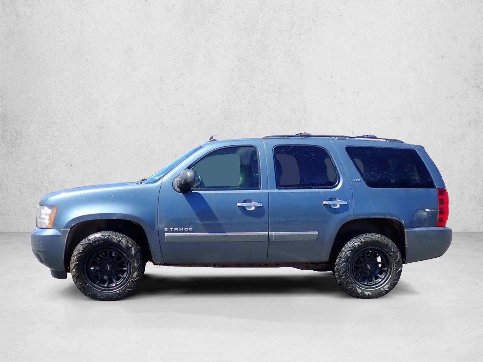 Used 2009 Chevrolet Tahoe LTZ with VIN 1GNFK33069J124094 for sale in Littleton, CO