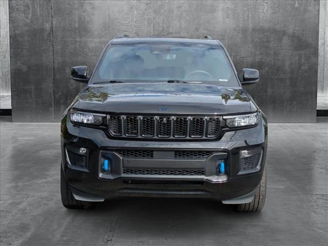 Used 2024 Jeep Grand Cherokee Anniversary Edition 4xe with VIN 1C4RJYB68R8512060 for sale in Littleton, CO