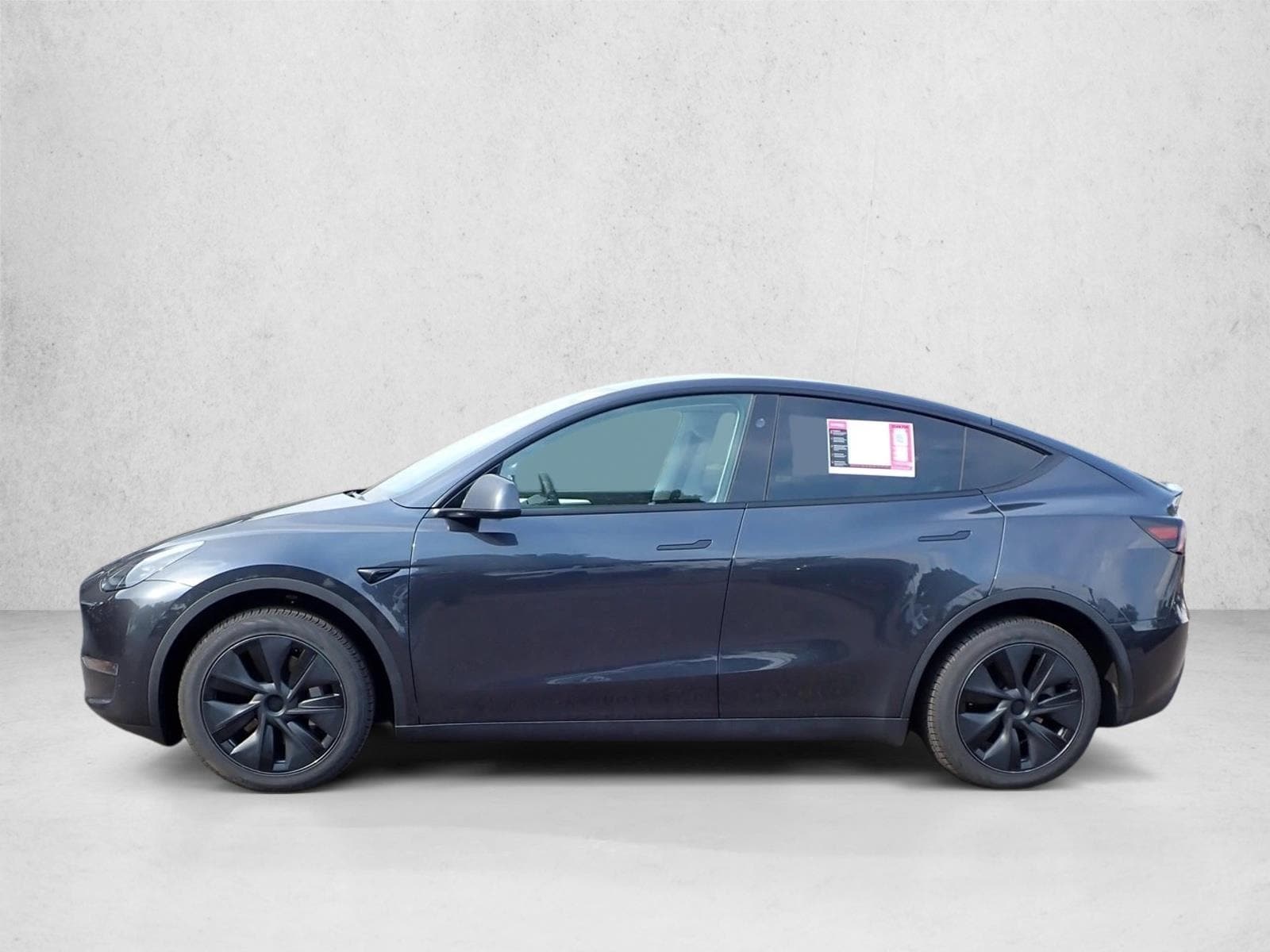 Used 2025 Tesla Model Y Long Range with VIN 7SAYGDEE8SF236090 for sale in Littleton, CO