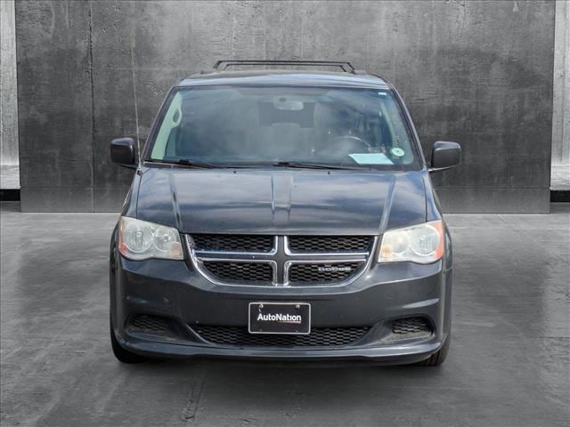 Used 2012 Dodge Grand Caravan SXT with VIN 2C4RDGCG1CR149704 for sale in Littleton, CO