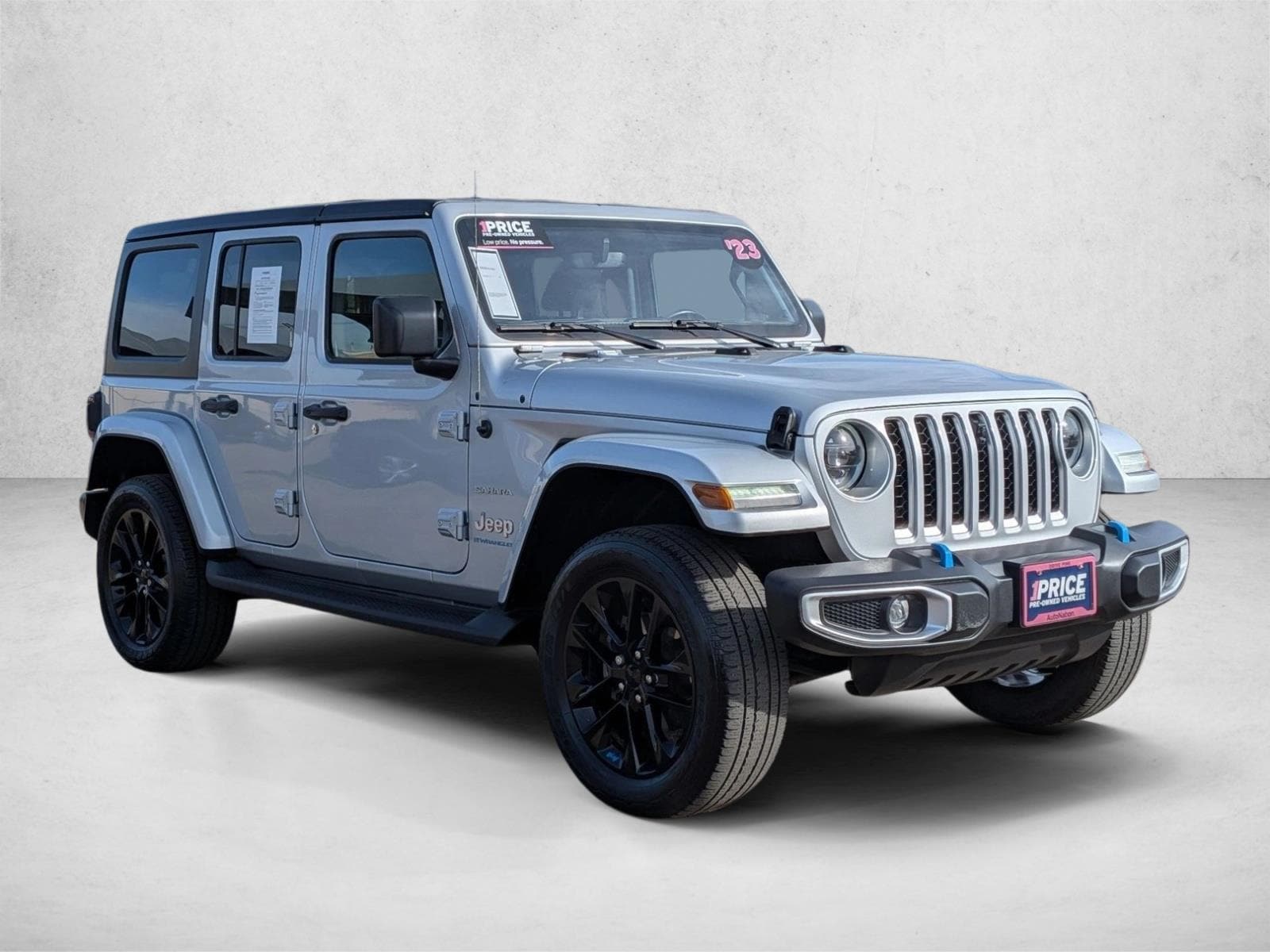 Used 2023 Jeep Wrangler 4xe Sahara 4XE with VIN 1C4JJXP63PW557688 for sale in Littleton, CO